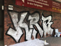 Graffiti auf Klinkerfassade